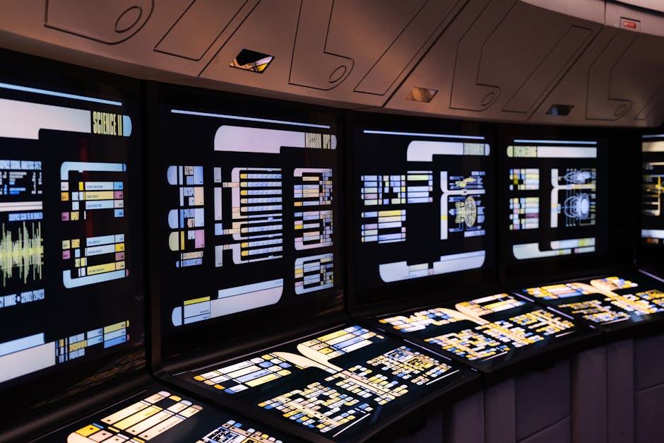 A high-tech command center with illuminated digital screens in a futuristic setting