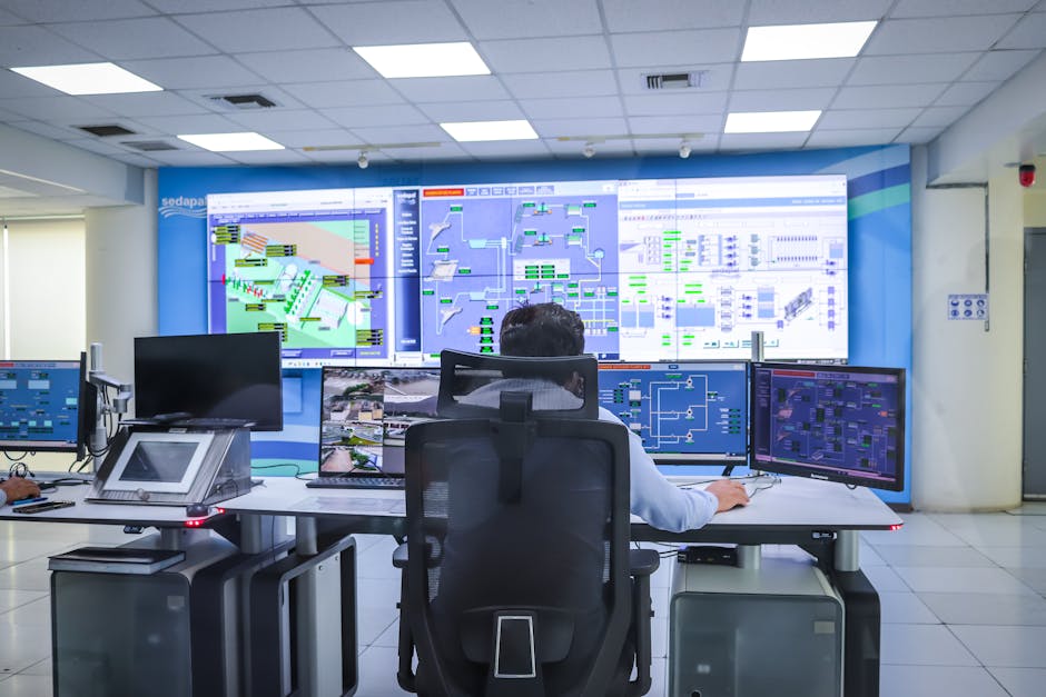 Operator in a modern control room managing technological systems in El Agustino, Lima